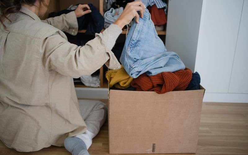 sorting through clothing
